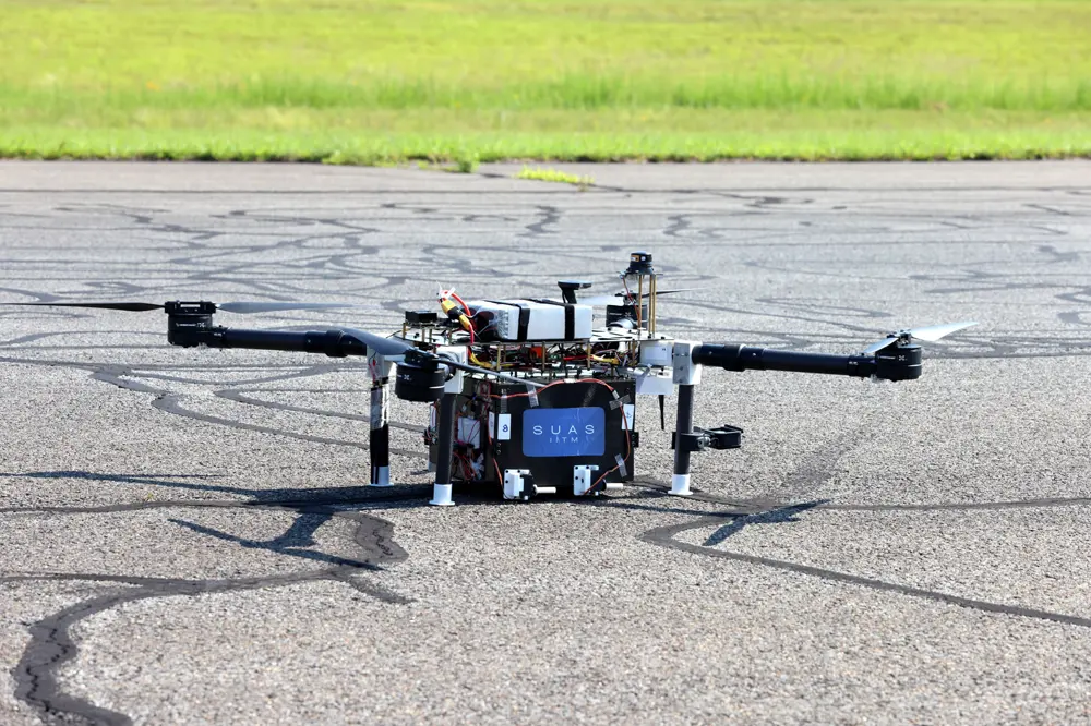 Shadow, a carbon-fibre autonomous X-quadcopter, on the runway during field testing